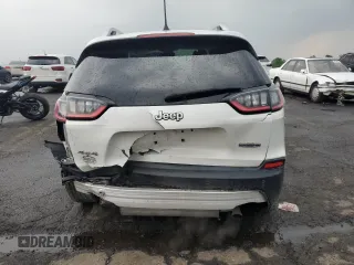 2019 Jeep Cherokee Altitude z VIN 1C4PJMLX6KD415525, wystawiony jako Copart lot #59932625 z przebiegiem 94 267 mil mil oraz Szkoda całkowita • Salvage title. Historia ofert i sprzedaży dostępna na DreamBid. Obrazek 6.