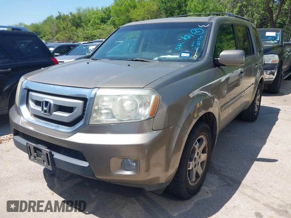 2011 Honda Pilot Touring with VIN 5FNYF4H94BB021952, listed as a IAAI auction lot 41985940 with 170,043 mi miles. Bid and sale history available at carsss.com. Image 16.