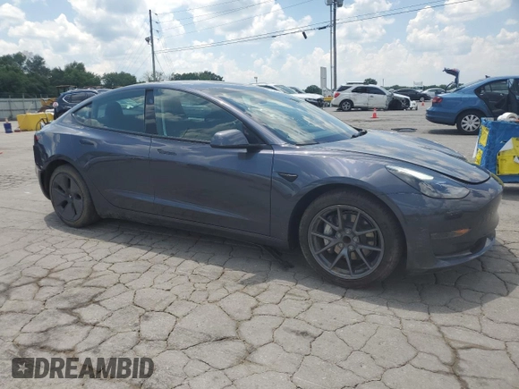 2023 Tesla Model 3 with VIN 5YJ3E1EA7PF576007, listed as a Copart auction lot 61674915 with 15,956 mi miles and Salvage title. Bid and sale history available at DreamBid. Image 4.
