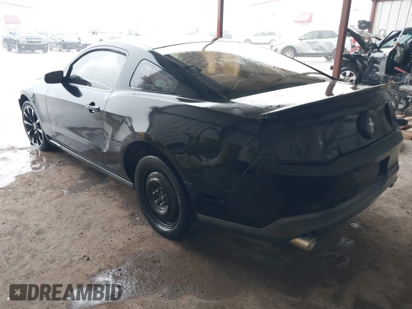 2012 Ford Mustang V6 Premium with VIN 1ZVBP8AM5C5223787, listed as a IAAI auction lot 42141944 with 73,960 mi miles. Bid and sale history available at carsss.com. Image 3.