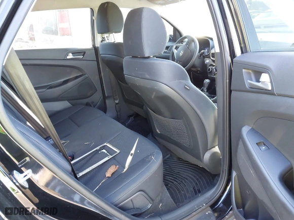 2019 Hyundai Tucson Value with VIN KM8J33A4XKU979791, listed as a IAAI auction lot 41255630 with 90,807 mi miles. Bid and sale history available at carsss.com. Image 8.