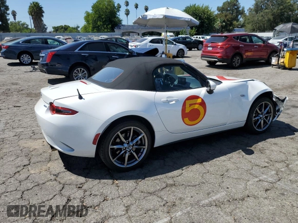2021 Mazda MX-5 Miata Grand Touring with VIN JM1NDAD77M0459510, listed as a Copart auction lot 68654874 with 39,657 mi miles and Salvage title. Bid and sale history available at DreamBid. Image 3.