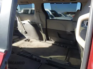 2015 Toyota Sienna XLE with VIN 5TDYK3DCXFS621190, listed as a IAAI auction lot 41646481 with 173,817 mi miles. Bid and sale history available at carsss.com. Image 8.