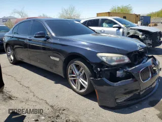 2014 BMW 7 Series ALPINA B7 with VIN WBAYE8C57ED136312, listed as a Copart auction lot 56057305 with 137,127 mi miles and Salvage title. Bid and sale history available at DreamBid. Image 4.