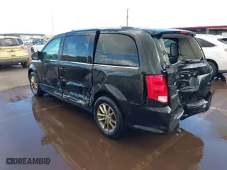 2020 Dodge Grand Caravan SXT with VIN 2C4RDGCG1LR248961, listed as a IAAI auction lot 41338107 with 105,027 mi miles. Bid and sale history available at carsss.com. Image 3.