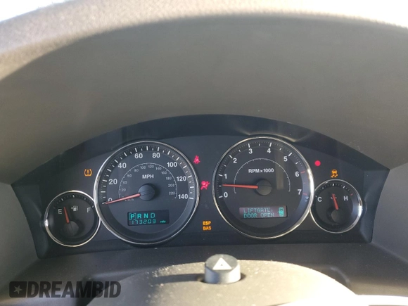 2006 Jeep Commander with VIN 1J8HG48K56C293759, listed as a Copart auction lot 86231064 with 173,203 mi miles and Salvage Title. Bid and sale history available at carsss.com. Image 9.