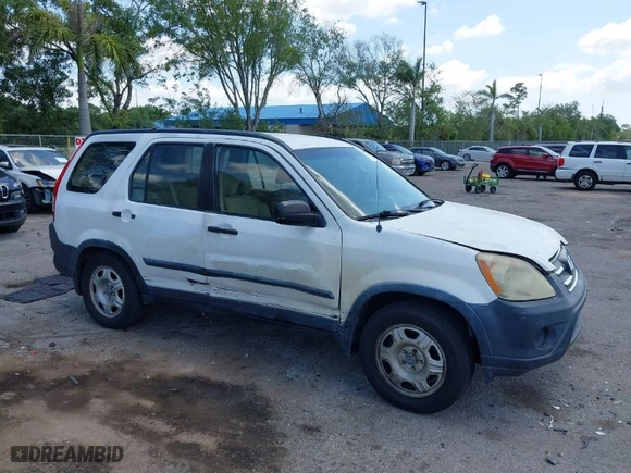 2005 Honda CR-V LX with VIN JHLRD68565C005484, listed as a IAAI auction lot 41983513 with 215,839 mi miles. Bid and sale history available at carsss.com. Image 1.