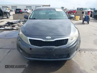 2011 Kia Optima LX with VIN KNAGM4A72B5057583, listed as a IAAI auction lot 41649320 with 207,898 mi miles and . Bid and sale history available at DreamBid. Image 12.