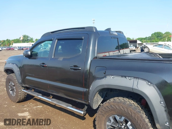 2017 Toyota Tacoma SR5 with VIN 3TMCZ5ANXHM099610, listed as a IAAI auction lot 42441050 with 85,046 mi miles and . Bid and sale history available at DreamBid. Image 14.