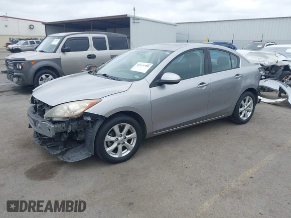 2011 Mazda 3 i Touring with VIN JM1BL1VG1B1385836, listed as a IAAI auction lot 42174780 with 169,988 mi miles and . Bid and sale history available at DreamBid. Image 2.