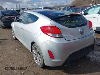 2017 Hyundai Veloster with VIN KMHTC6AD6HU310694, listed as a IAAI auction lot 41734446 with 99,432 mi miles. Bid and sale history available at carsss.com. Image 3.