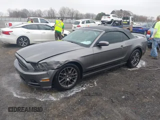 2014 Ford Mustang V6 with VIN 1ZVBP8EM1E5228353, listed as a IAAI auction lot 41525666 with 138,024 mi miles. Bid and sale history available at carsss.com. Image 2.