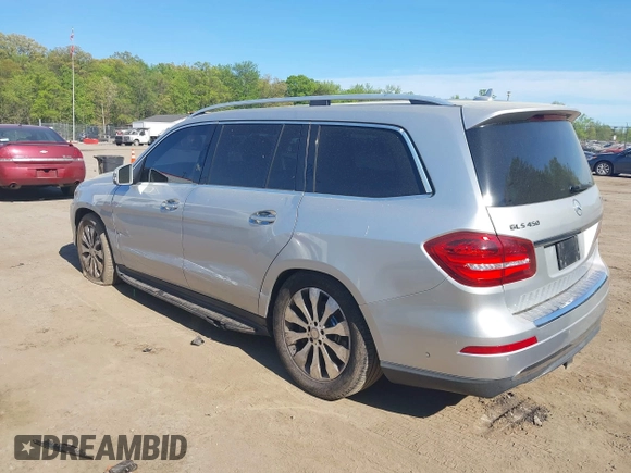 2017 Mercedes-Benz GLS 450 with VIN 4JGDF6EE8HA873584, listed as a IAAI auction lot 42106238 with 82,759 mi miles and . Bid and sale history available at DreamBid. Image 3.