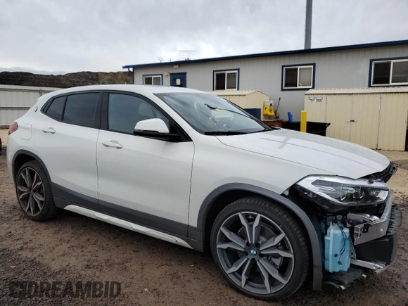 2022 BMW X2 sDrive28i with VIN WBXYH9C02N5U69017, listed as a Copart auction lot 68391504 with 5,201 mi miles and Salvage Title. Bid and sale history available at carsss.com. Image 4.