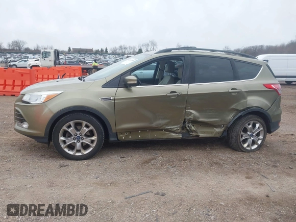 2013 Ford Escape SEL with VIN 1FMCU0HX9DUC77808, listed as a IAAI auction lot 41967998 with 71,196 mi miles. Bid and sale history available at carsss.com. Image 14.