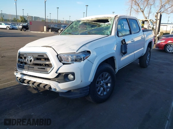 2017 Toyota Tacoma SR5 with VIN 3TMAZ5CN8HM040978, listed as a IAAI auction lot 41847492 with 103,731 mi miles and . Bid and sale history available at DreamBid. Image 2.