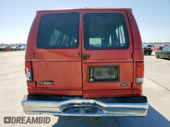 2001 Ford Econoline Passenger XL with VIN 1FBSS31L21HA40360, listed as a Copart auction lot 46909575 with 317,780 mi miles and Salvage title. Bid and sale history available at DreamBid. Image 6.