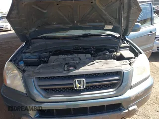 2005 Honda Pilot EX with VIN 2HKYF184X5H539427, listed as a IAAI auction lot 42004991 with 173,623 mi miles. Bid and sale history available at carsss.com. Image 10.