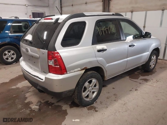 2009 Kia Sportage LX with VIN KNDJE723097571708, listed as a IAAI auction lot 41494118 with 140,869 mi miles. Bid and sale history available at carsss.com. Image 4.