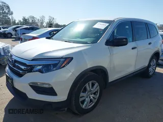 2016 Honda Pilot LX with VIN 5FNYF5H12GB051880, listed as a IAAI auction lot 41965816 with 112,705 mi miles and . Bid and sale history available at DreamBid. Image 2.