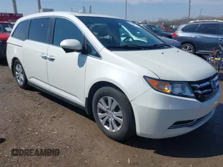 2016 Honda Odyssey EX-L with VIN 5FNRL5H68GB160563, listed as a IAAI auction lot 41962881 with 121,429 mi miles. Bid and sale history available at carsss.com. Image 1.