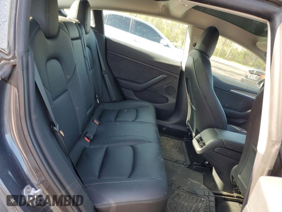 2023 Tesla Model 3 z VIN 5YJ3E1EAXPF404814, wystawiony jako Copart lot #56857105 z przebiegiem 59 360 mil mil oraz Czysty tytuł • Clean title. Historia ofert i sprzedaży dostępna na DreamBid. Obrazek 10.