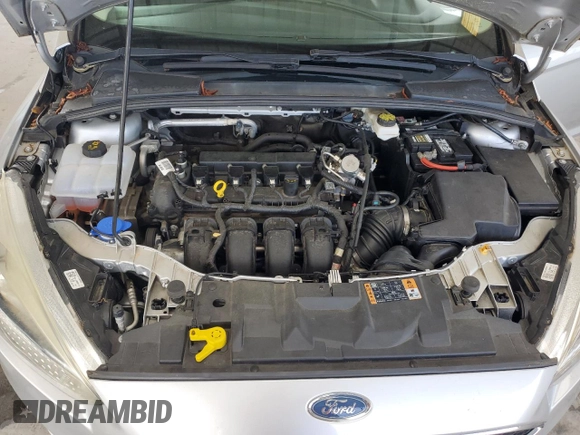 2018 Ford Focus SE z VIN 1FADP3F25JL265168, wystawiony jako Copart lot #56541895 z przebiegiem Nie podano mil oraz Szkoda całkowita • Salvage title. Historia ofert i sprzedaży dostępna na DreamBid. Obrazek 11.