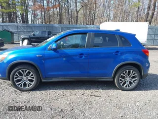 2017 Mitsubishi Outlander ES z VIN JA4AR3AUXHZ007018, wystawiony jako IAAI lot #41790311 z przebiegiem 142 299 mil mil oraz . Historia ofert i sprzedaży dostępna na DreamBid. Obrazek 14.