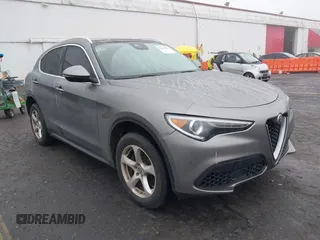 2018 Alfa Romeo Stelvio z VIN ZASFAKAN3J7B72892, wystawiony jako IAAI lot #41853006 z przebiegiem 99 773 mil mil oraz . Historia ofert i sprzedaży dostępna na DreamBid. Obrazek 1.