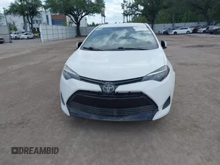 2019 Toyota Corolla L with VIN 5YFBURHE7KP908794, listed as a IAAI auction lot 38524964 with 65,069 mi miles. Bid and sale history available at carsss.com. Image 6.