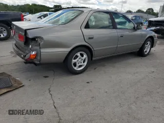 2000 Toyota Camry CE z VIN 4T1BG22KXYU639808, wystawiony jako Copart lot #56606985 z przebiegiem 119 678 mil mil oraz Szkoda całkowita • Salvage title. Historia ofert i sprzedaży dostępna na DreamBid. Obrazek 3.