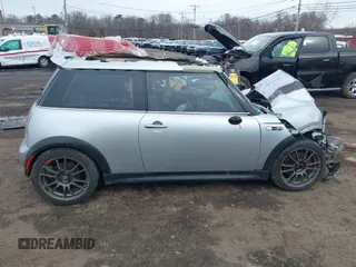 2006 MINI Hardtop S with VIN WMWRE33546TL23876, listed as a IAAI auction lot 41858060 with 146,359 mi miles and . Bid and sale history available at DreamBid. Image 13.