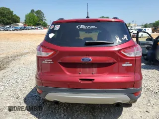 2014 Ford Escape SE with VIN 1FMCU0GX2EUD62962, listed as a Copart auction lot 54368775 with 63,495 mi miles and Salvage Title. Bid and sale history available at DreamBid. Image 6.