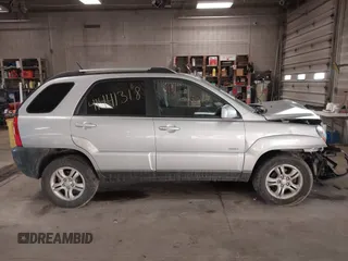 2005 Kia Sportage LX with VIN KNDJE723X57071792, listed as a IAAI auction lot 41441318 with 249,652 mi miles and . Bid and sale history available at carsss.com. Image 14.