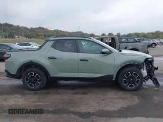 2022 Hyundai Santa Cruz SEL z VIN 5NTJCDAE1NH032206, wystawiony jako IAAI lot #40698704 z przebiegiem 40 182 mil mil oraz . Historia ofert i sprzedaży dostępna na DreamBid. Obrazek 14.