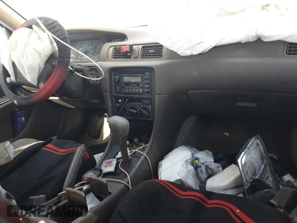 1999 Toyota Camry LE z VIN JT2BF28K5X0200853, wystawiony jako Copart lot #50666075 z przebiegiem Nie podano mil oraz Nie do naprawy • Non repairable. Historia ofert i sprzedaży dostępna na DreamBid. Obrazek 8.