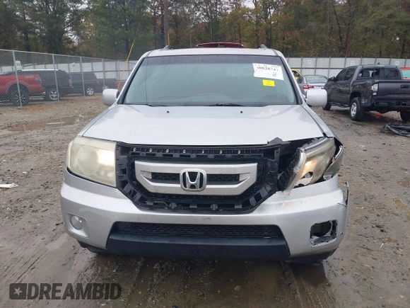 2010 Honda Pilot Touring with VIN 5FNYF3H89AB005861, listed as a IAAI auction lot 40828747 with 275,757 mi miles and . Bid and sale history available at DreamBid. Image 12.