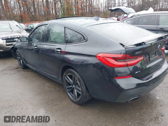 2018 BMW 6 Series 640i xDrive with VIN WBAJV6C55JBK07051, listed as a IAAI auction lot 41505732 with 96,172 mi miles and . Bid and sale history available at carsss.com. Image 3.