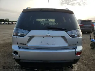 2009 Mitsubishi Outlander XLS with VIN JA4MT31X89Z607661, listed as a Copart auction lot 70989854 with 218,605 mi miles and Clean Title. Bid and sale history available at carsss.com. Image 6.