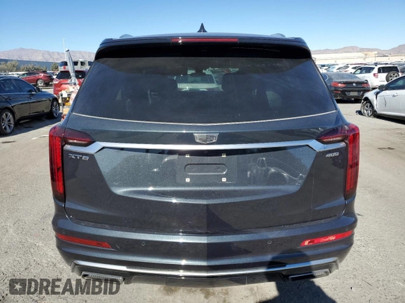 2022 Cadillac XT6 Premium Luxury with VIN 1GYKPCRS9NZ125022, listed as a Copart auction lot 42392485 with 34,703 mi miles and Salvage Title. Bid and sale history available at carsss.com. Image 6.
