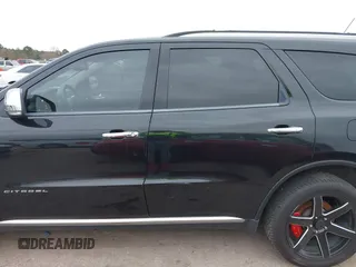2011 Dodge Durango Citadel with VIN 1D4SE5GTXBC695700, listed as a IAAI auction lot 41381731 with 152,055 mi miles. Bid and sale history available at carsss.com. Image 14.