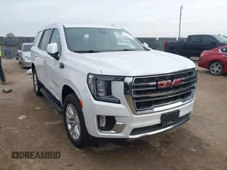 2021 GMC Yukon SLT with VIN 1GKS1BKD1MR489922, listed as a IAAI auction lot 40972652 with 77,791 mi miles. Bid and sale history available at carsss.com. Image 1.