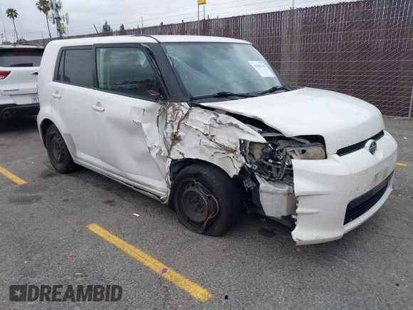 2014 Scion xB with VIN JTLZE4FEXEJ054060, listed as a IAAI auction lot 42096159 with 211,994 mi miles. Bid and sale history available at carsss.com. Image 1.
