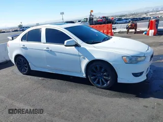 2009 Mitsubishi Lancer GTS with VIN JA3AU86W89U009617, listed as a IAAI auction lot 41409767 with 215,559 mi miles and . Bid and sale history available at carsss.com. Image 12.