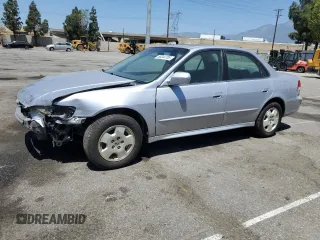 2002 Honda Accord EX z VIN 1HGCG16582A001090, wystawiony jako Copart lot #58244785 z przebiegiem 99 158 mil mil oraz Szkoda całkowita • Salvage title. Historia ofert i sprzedaży dostępna na DreamBid. Obrazek 1.