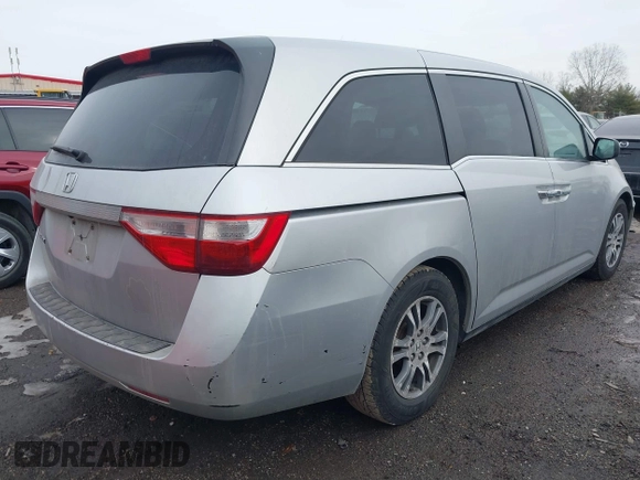 2013 Honda Odyssey EX-L with VIN 5FNRL5H63DB007682, listed as a IAAI auction lot 41408103 with 201,453 mi miles and . Bid and sale history available at carsss.com. Image 4.