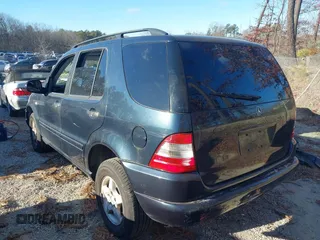 2000 Mercedes-Benz M-Class with VIN 4JGAB54E0YA146627, listed as a IAAI auction lot 41292173 with 116,790 mi miles. Bid and sale history available at carsss.com. Image 3.