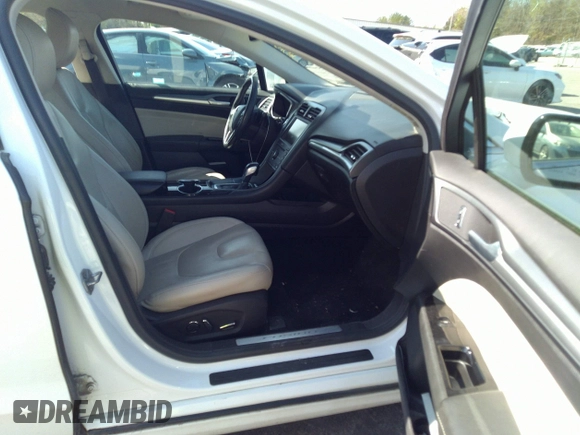 2016 Ford Fusion Titanium with VIN 3FA6P0K93GR347016, listed as a IAAI auction lot 41850780 with 215,872 mi miles and . Bid and sale history available at carsss.com. Image 5.
