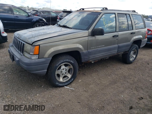 1997 Jeep Grand Cherokee Laredo z VIN 1J4GZ58S4VC502596, wystawiony jako Copart lot #88255865 z przebiegiem Nie podano mil oraz Nie do naprawy • Non repairable. Historia ofert i sprzedaży dostępna na DreamBid. Obrazek 1.