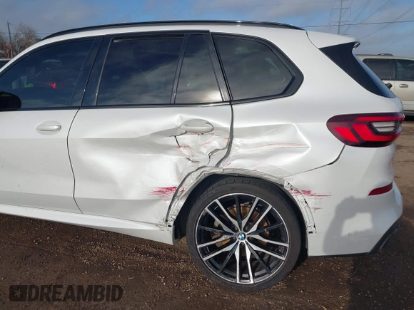 2021 BMW X5 sDrive40i with VIN 5UXCR4C00M9D80482, listed as a IAAI auction lot 41636009 with 85,103 mi miles. Bid and sale history available at carsss.com. Image 6.